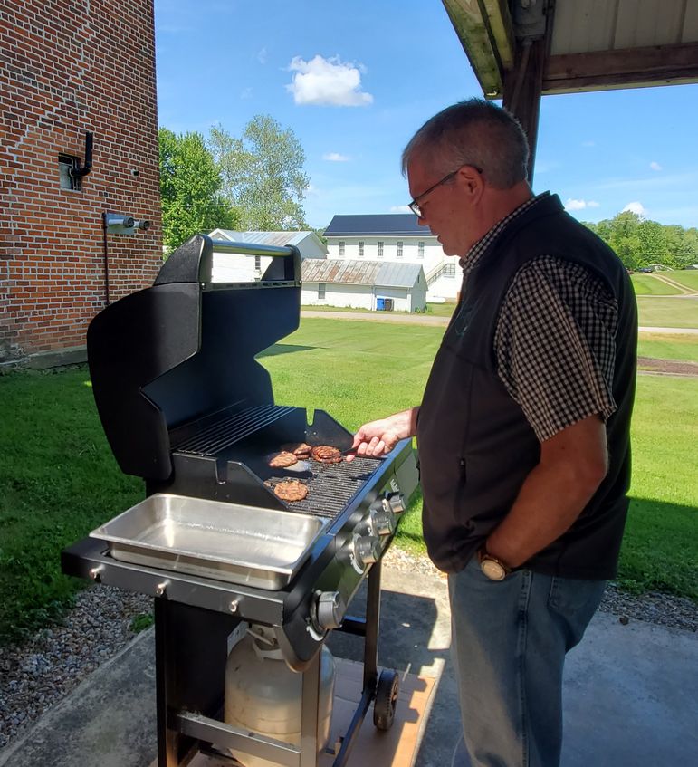 pastor at the grill