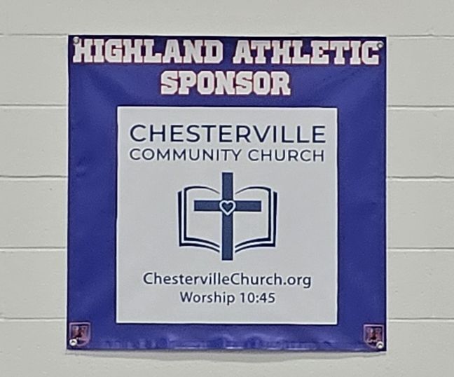 Our banner in the Highland school gym